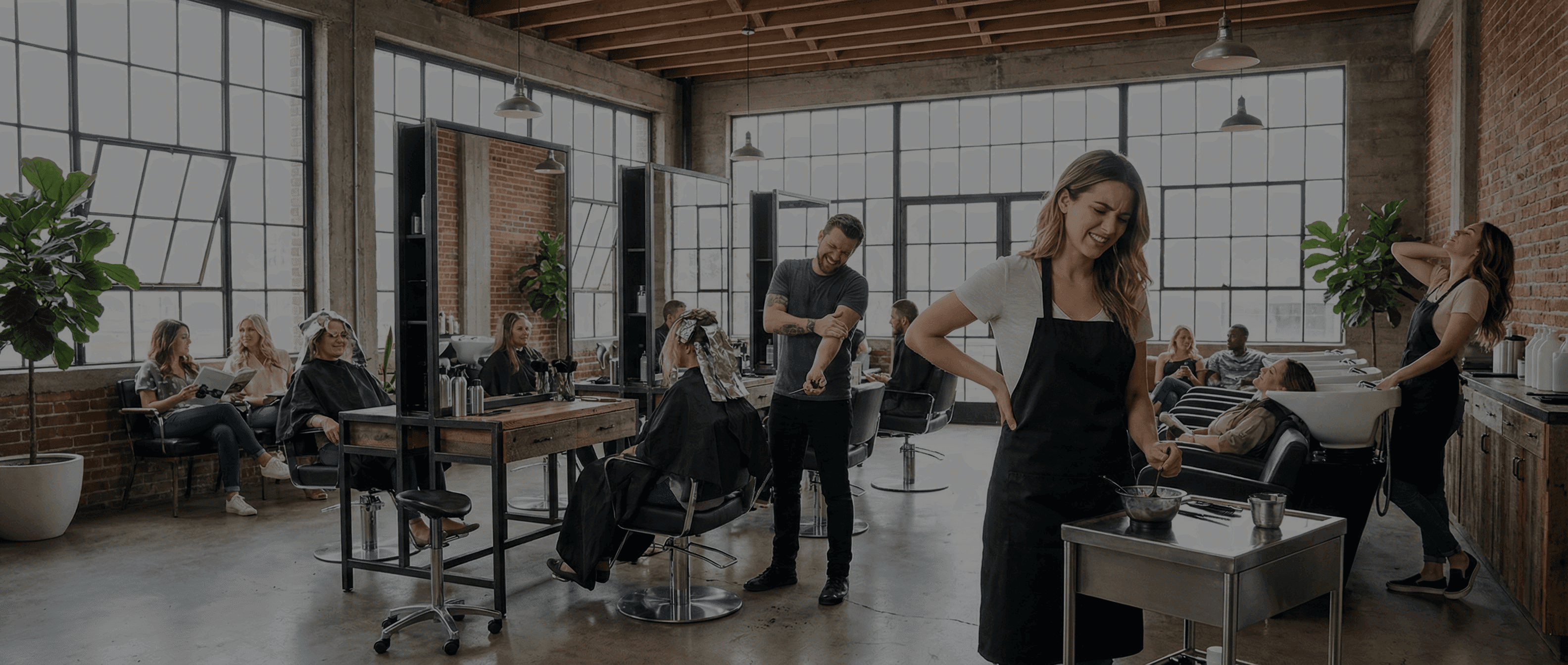Hairdressers at work in a busy salon
